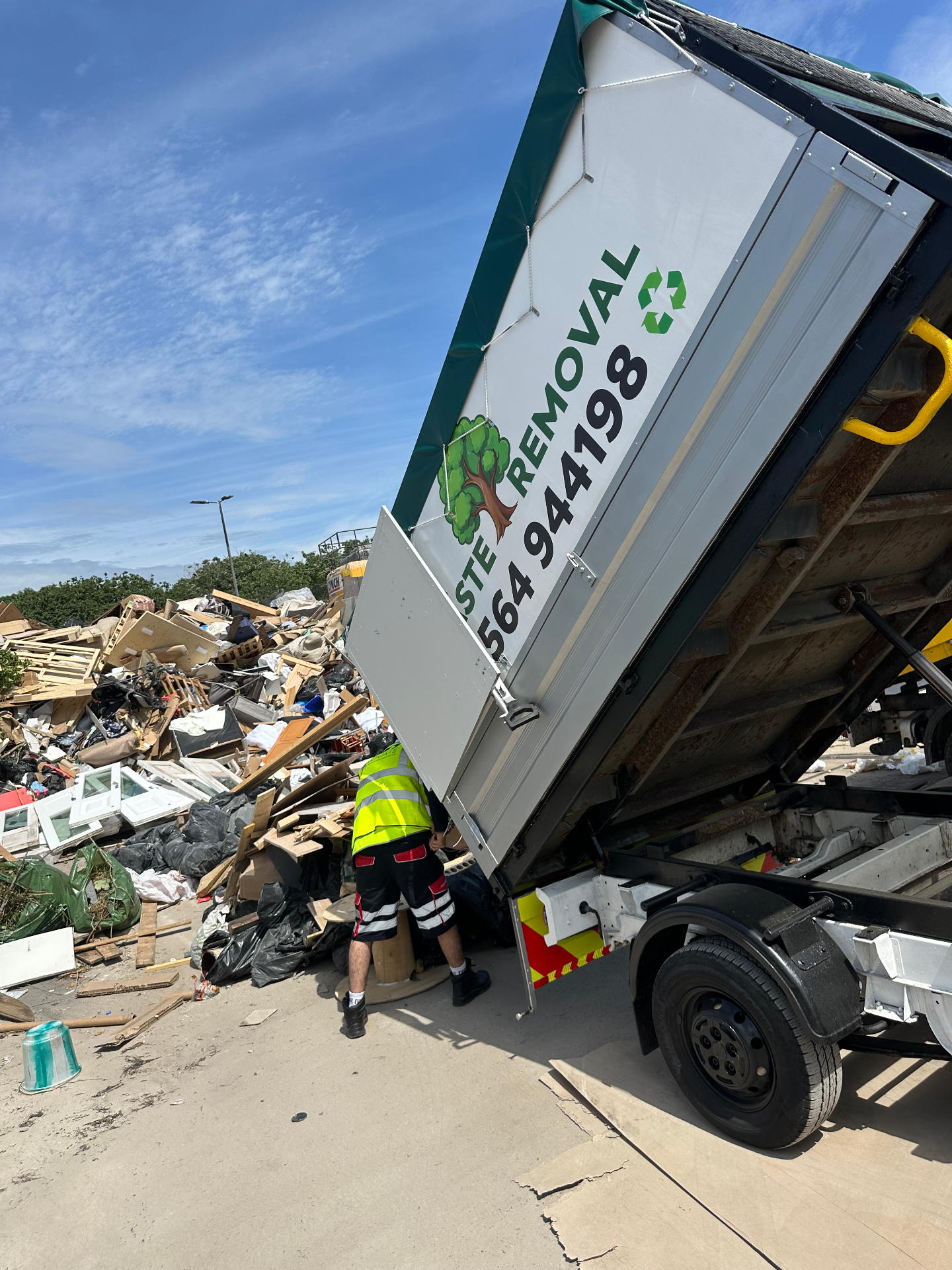 EBX Services tipper truck unloading at recycling site